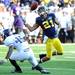Michigan wide receiver Roy Roundtree reaches out to catch a last second catch in the fourth quarter as Northwestern cornerback Daniel Jones looks on at Michigan Stadium on Saturday. Melanie Maxwell I AnnArbor.com